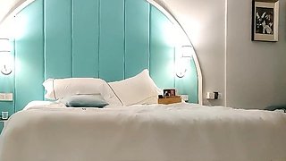 Cute amateur asian web cam girl playing with her toy