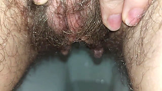 the longest trip to the bathroom, a very long piss, a hairy pussy peeing