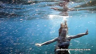 Nastya swimming nude in the sea