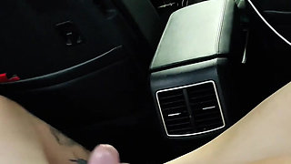 Girl gives handjob in the car with the help of her feet