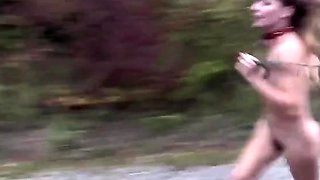 Leashed slave girl runs naked and learns to fetch