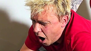 Femdom. He Smokes a Cigarette and a Busty Woman Fucks Him Hard in the Ass with a Strapon.