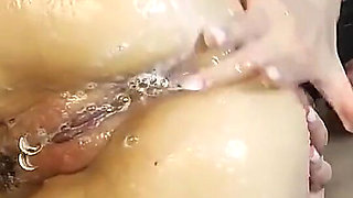 Two Hot Lesbians Fuck Dildos in the Shower, Kiss Passionately and Squirt