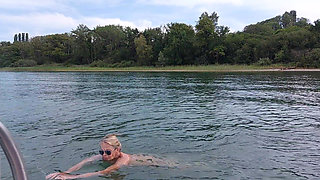 Sexy Granny Swims Naked in a Lake!