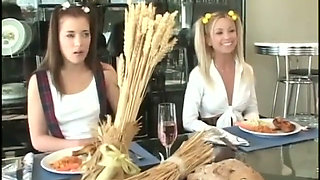 She makes out with one guy while the other eats out her pussy in living room