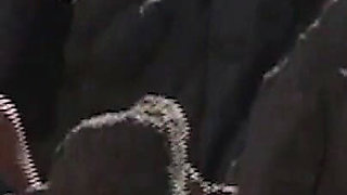 She Lies Naked on the Beach While He Watches Her