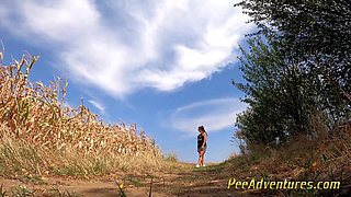 Pissing on a dirt road in the middle of no-were
