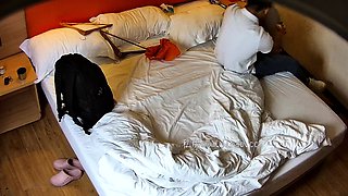 Cute amateur asian web cam girl playing with her toy