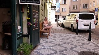 Naughty European teen flashing perky titties in public