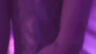 Young Girl Using Her Feet to Play with the Dildo While Masturbating