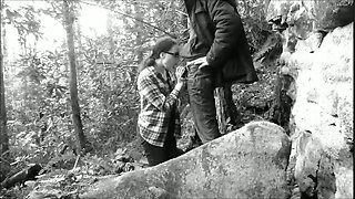 Black and white video of my slutty girlfriend sucking my dick in the forest