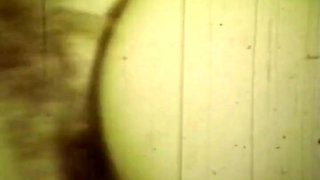 Worn Sepia Loop Captures Curly Retro Couple in Raw Bedroom Passion