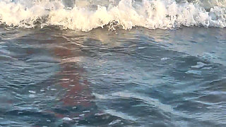Try Not to Wet My Hair While Play with the Waves
