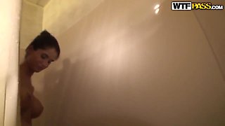 Sexy and busty brunette Nessa Devil has been caught naked