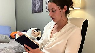 Voyeur of sexy brunette reading a hot romance novel and
