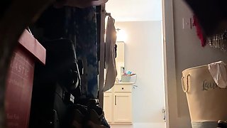 Hidden cam in the bathroom captures sexy stepmom naked