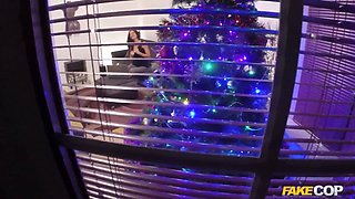 Cop fucks camera chick in front of her christmas tree - faux cop