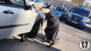 Dirndl Slut Gets Dirty and Oily Changing Tires