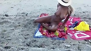 My stepdaughter teases me on the beach