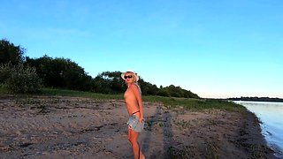 Russian Nudist on the River Shore