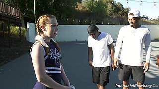 Horny cheerleader named Arietta Adams is mouthfucked by strong black studs
