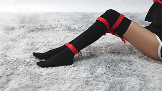 A Young, Beautiful, Slender, and Adorable Girlfriend, with Black Stockings, Red Strings, and Restraints