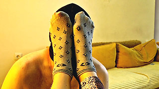 Fetish of legs and feet after boots. Dominatrix allowed slave to take off her boots, to sniff her sweaty socks, to kiss her feet