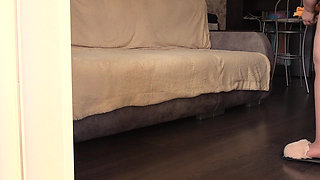 A Neighbor Watches a Mature Housewife with a Juicy Ass in Nylon Pantyhose Through an Open Window.