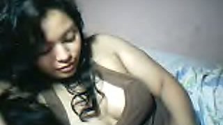 Gorgeous Filipina girl flashing her titties on webcam