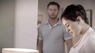 Guy fucks a busty brunette milf as his wife is next to them