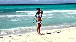 Sexy Monika Fox Walks Along Beach