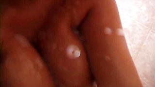Showering hottie with natural tits Autumn-Jade shows off her body