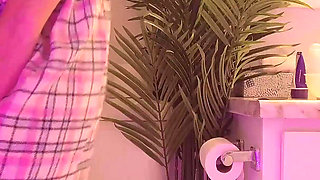 Emily pissing in the bathroom