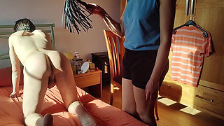 Woman Spanking a Stripper