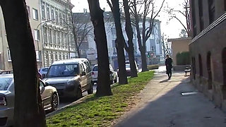 Blonde bitch pissing on the city street