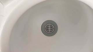 Moaning daddy has a lot of pressure and milks his cock in the public toilet