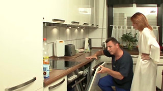 In the Kitchen the Plumber Gets a Hot Matured Housewife with Sexy Red Underwear to Fuck!