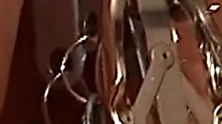 Chained Cougar Gets Her Pussy Heavily Clamped and Weighted