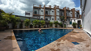 watch us playing in our swimming pool