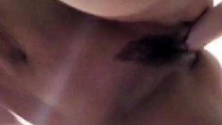 Gymnast in the bath with a dildo