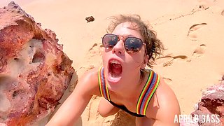 April BigAss Takes a Wild Piss on the Beach in Messy Watersports Action